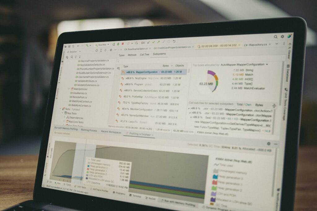 Laptop screen displaying analytics data charts and metrics dashboard