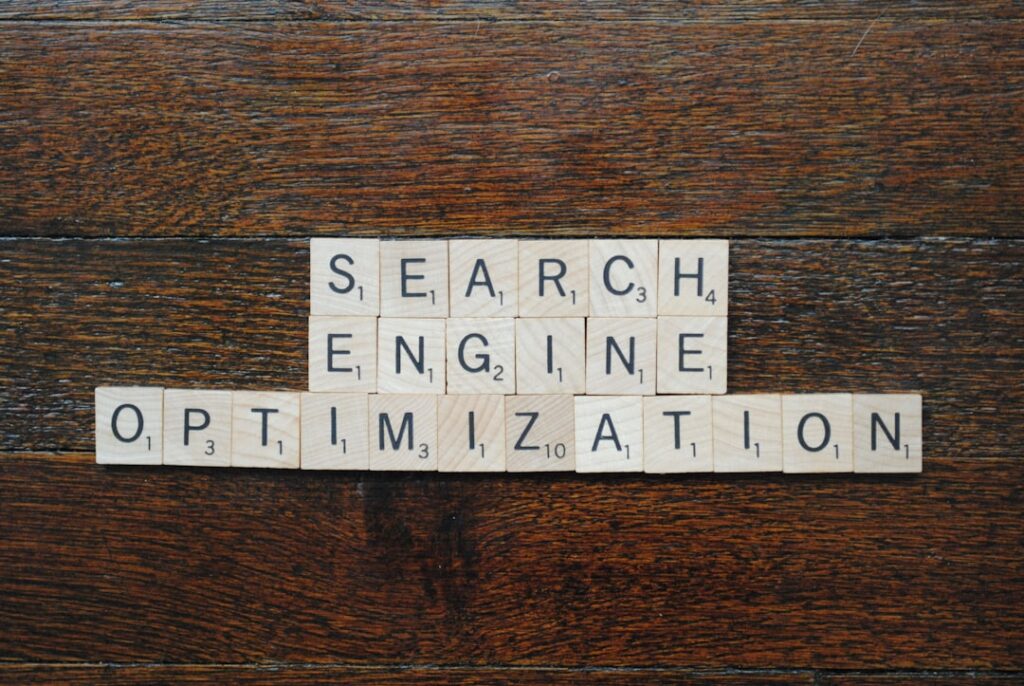 Scrabble tiles spelling out "Search Engine Optimization" representing content structure and heading optimization