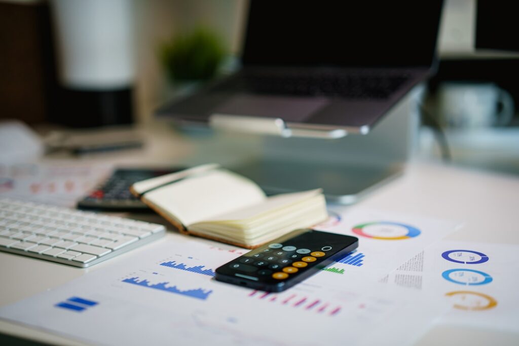 Financial report with calculator showing business budget planning and cost analysis for programmatic SEO