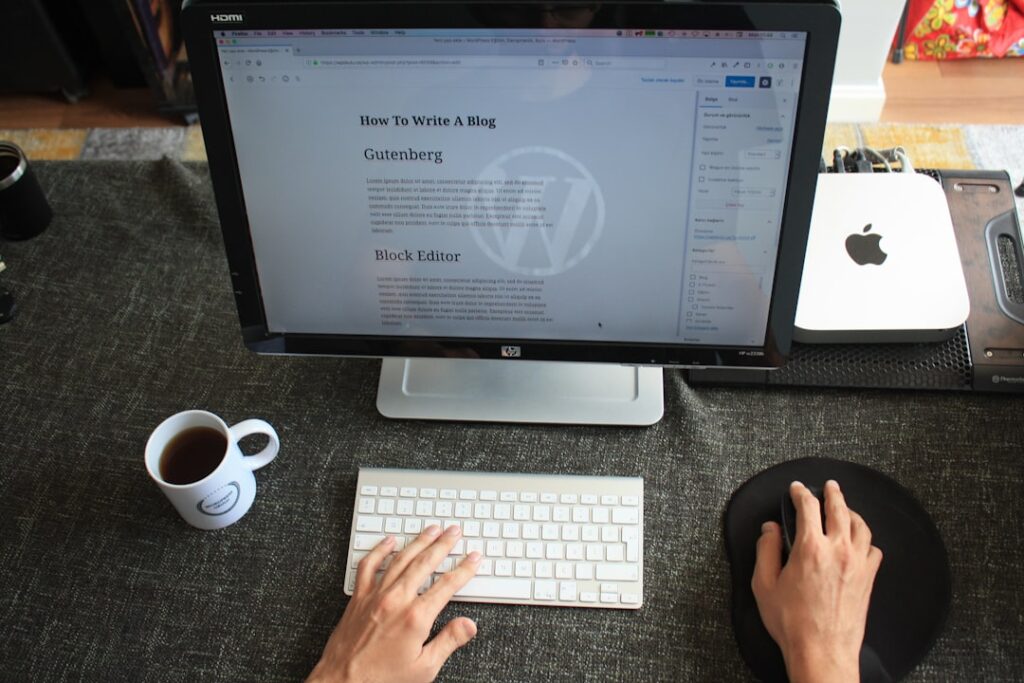 Content creator working on WordPress blog post using Gutenberg editor, demonstrating tactical implementation of AI search optimization strategies
