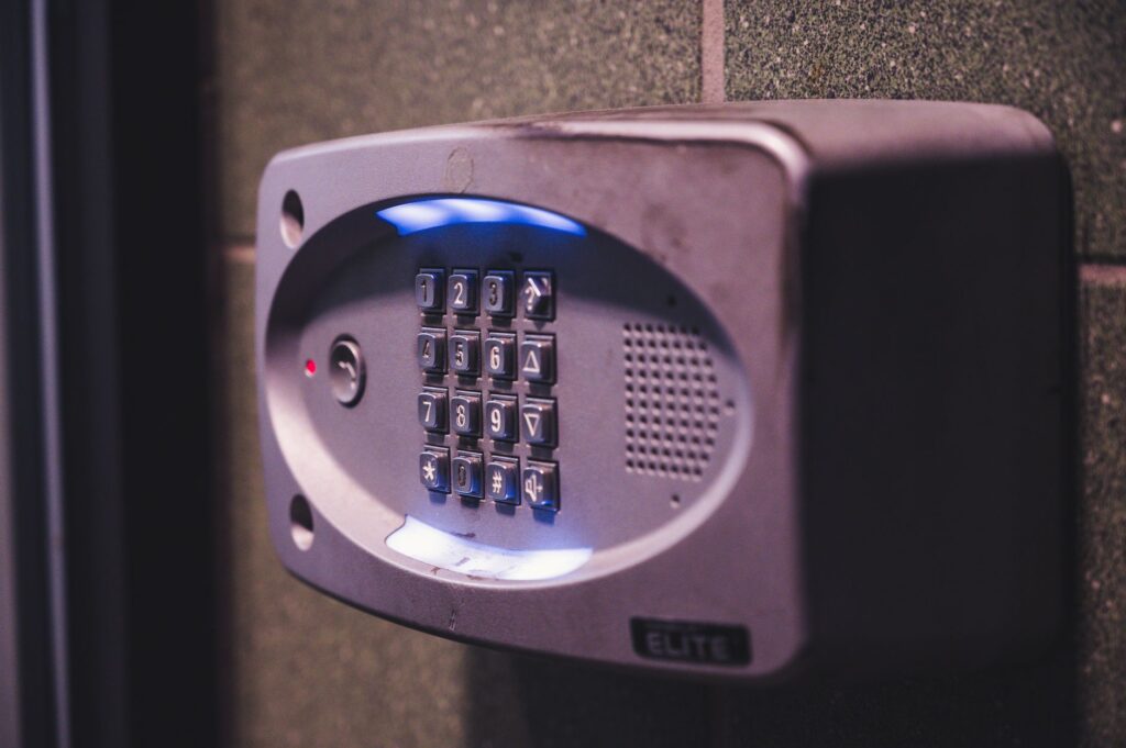 Illuminated security keypad on a wall representing access control and user capability permissions in WordPress