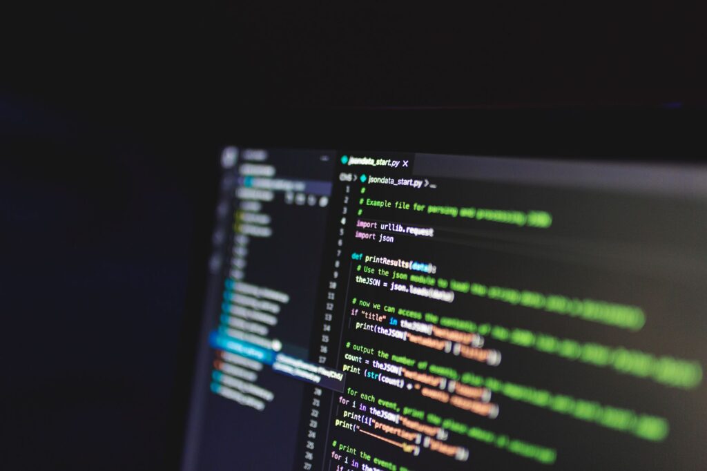 Python script open in a code editor showing import urllib.request and import json, illustrating the Python REST API workflow examples