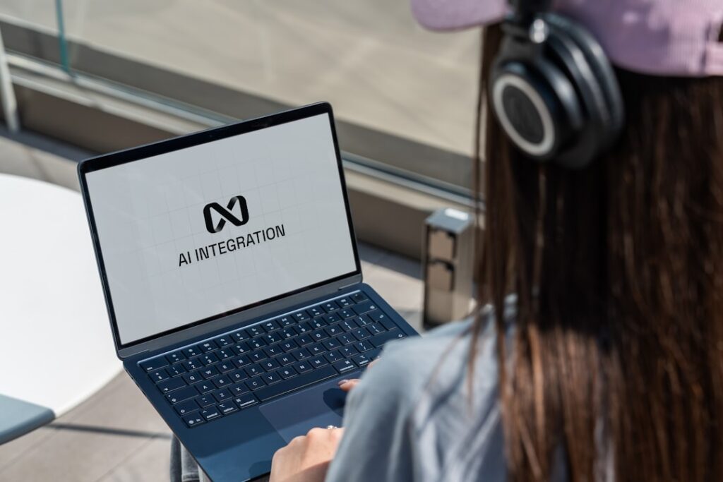 Person working on a laptop with AI integration software on the screen