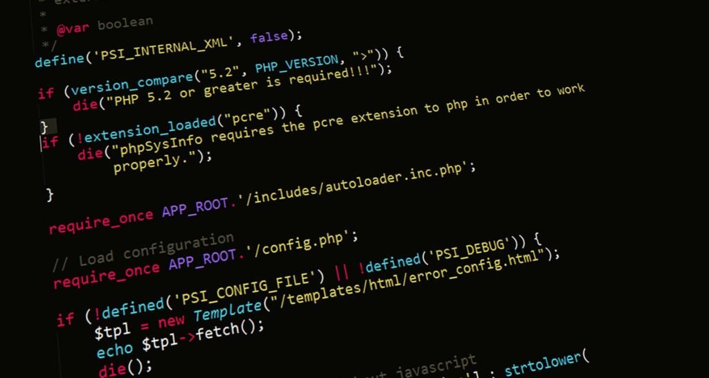 PHP code displayed on a dark monitor screen showing WordPress filter functions and server-side programming