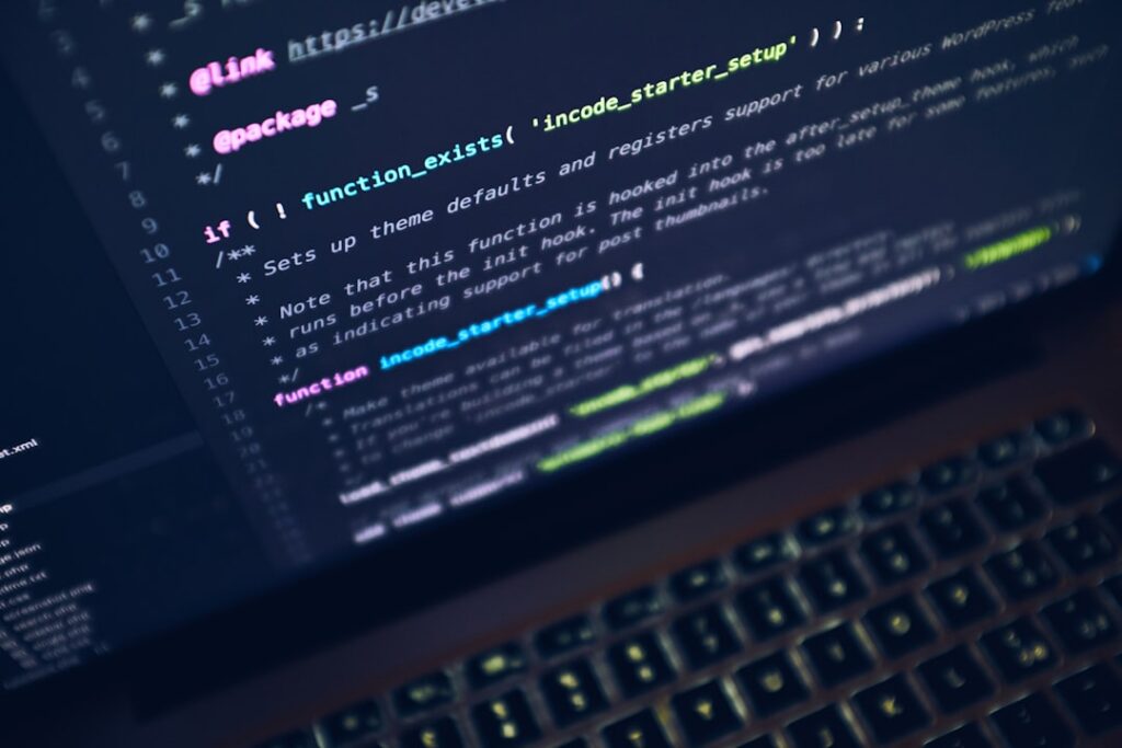 Close-up of PHP and WordPress code on a laptop screen for REST API testing
