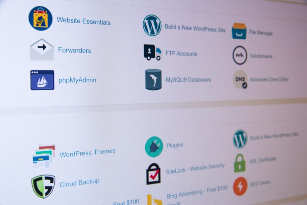 WordPress hosting control panel showing plugin categories including WordPress Themes, Plugins, Cloud Backup, and website essentials.