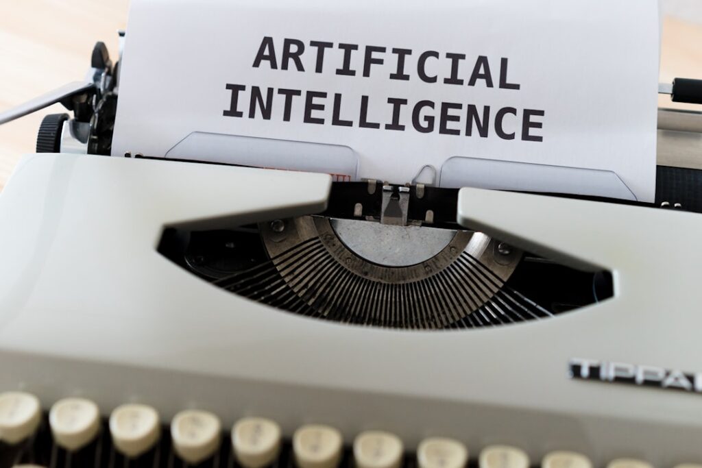 A typewriter with a sheet of paper reading "Artificial Intelligence" — representing AI-generated content and the shift from manual to automated blog writing.
