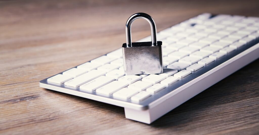 A padlock sitting on top of a white computer keyboard representing HTTPS and SSL security