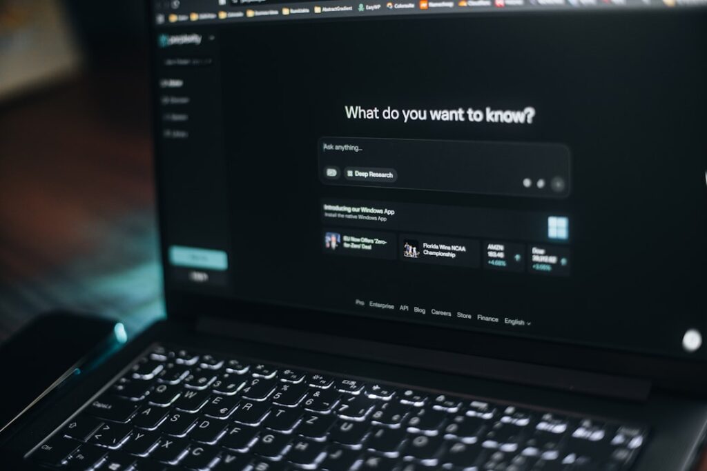 Perplexity AI dashboard open on a laptop showing the "What do you want to know?" search interface