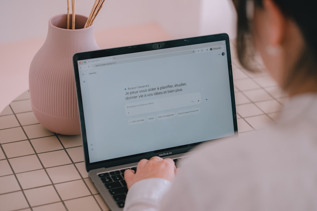 Person using an AI writing tool on a laptop, illustrating the Jasper AI pricing and content workflow topic. Photo by Unsplash.