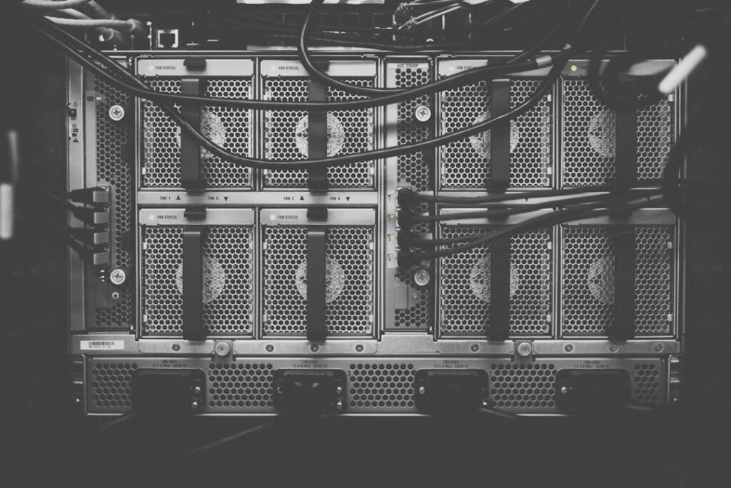 Server rack hardware in a data center, representing PHP server-level upload limits like upload_max_filesize and post_max_size that affect WordPress REST API media uploads
