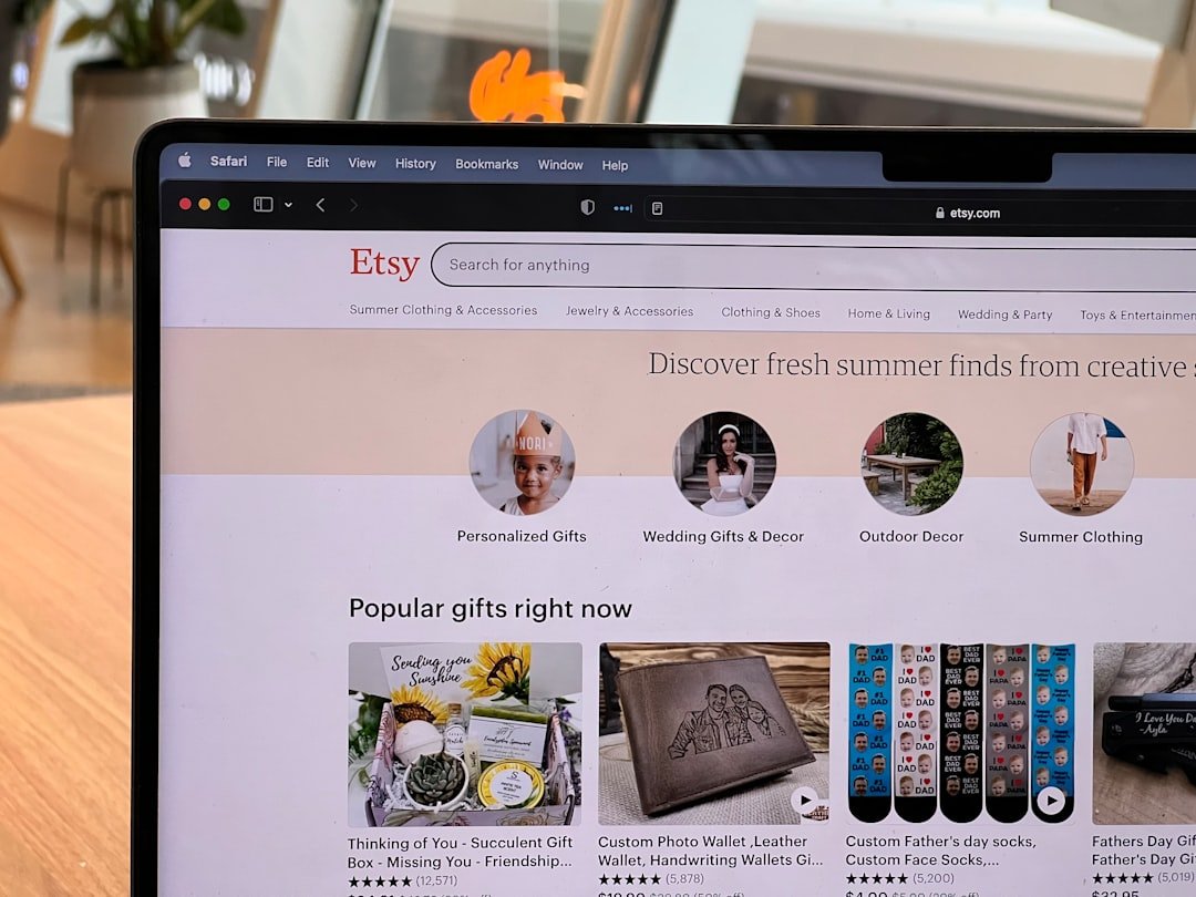 Etsy marketplace homepage displayed on a MacBook screen showing personalized gifts and handmade products